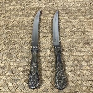 Pair OfRadiant Rose by International Silver Plated Knives, size 9 1/4"